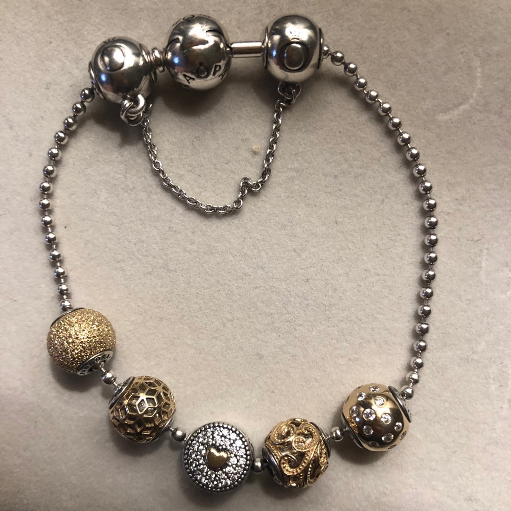 Pandora essence bracelet + charms and safety chain